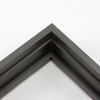 This tall, deep stair step floating canvas frame in matte black features a shallow recessed stair below the outer face and a natural wood grain texture. The canvas will hover neatly, resting on the lowest, flat edge.  

Give an authentic, fine art display to your favourite canvas Giclée print or acrylic painting. This canvas floating frame is ideal for medium, large or extra large canvases on thick (1.5 " deep) stretcher bars.

*Note: These solid wood, custom canvas floaters are for stretched canvas prints and paintings, and raised wood panels.